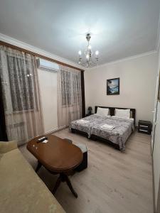 Voodi või voodid majutusasutuse Arm Hotel toas