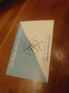 a piece of paper with a compass on a table at Rosa de los Vientos in Cádiz