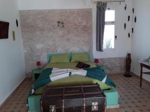 En eller flere senger på et rom på Dar De La Milonga