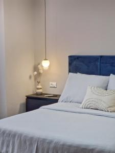 Кровать или кровати в номере Apartments Jasna