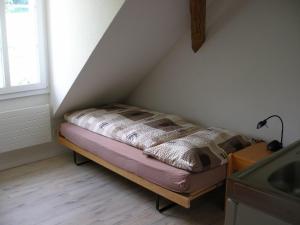Postel nebo postele na pokoji v ubytování Gasthof Rössli