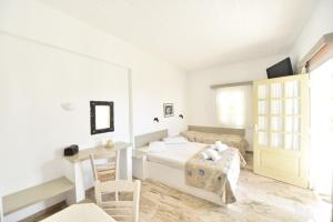 Postel nebo postele na pokoji v ubytování Vidalis Hotel