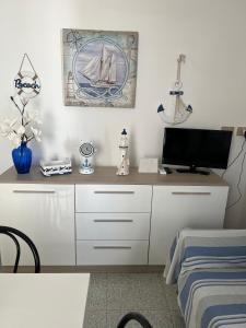 A television and/or entertainment centre at dimora la torre