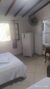 Ein Bett oder Betten in einem Zimmer der Unterkunft Pousada João e Maria