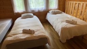 Postel nebo postele na pokoji v ubytování Merineitsi peamaja