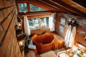 an overhead view of a bath tub in a room at Villa Tuiuty Pousada de Charme in Bento Gonçalves