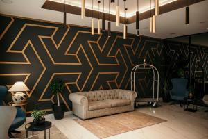 Гостиная зона в Hotel Lux Melide