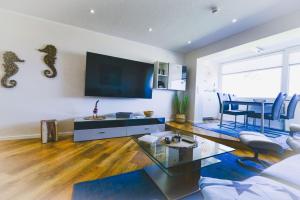 Et tv og/eller underholdning på Am Sahlenburger Strand AS23