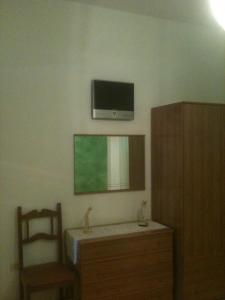 TV a/nebo společenská místnost v ubytování Terrazza sul Mare