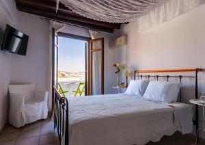 Cama ou camas em um quarto em Paradision Hotel