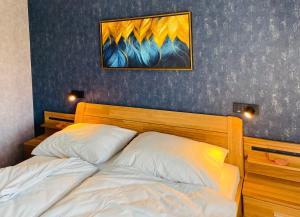 Postel nebo postele na pokoji v ubytování Apartmány Petr Vok