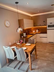 Kuchyň nebo kuchyňský kout v ubytování Apartmány Petr Vok