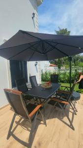 Gallery image of PineTrees Beach House with swimming pool in Golem