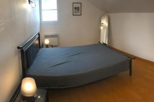 Postel nebo postele na pokoji v ubytování appart 3 chambres 76m2 centre historique