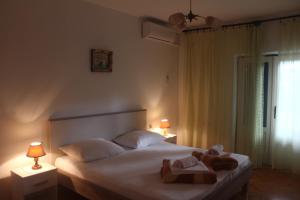 Ein Bett oder Betten in einem Zimmer der Unterkunft Apartment Jure