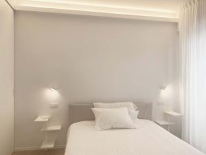 Ein Bett oder Betten in einem Zimmer der Unterkunft The window on the theatre and the cathedral - Luxury apartment