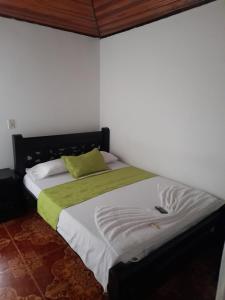 Postel nebo postele na pokoji v ubytování HOTEL NUEVO SOL