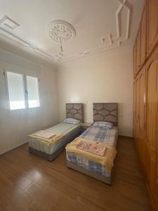 Postel nebo postele na pokoji v ubytování Appartement de vacances