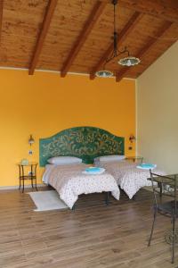 Een bed of bedden in een kamer bij B&B La Tartaruga