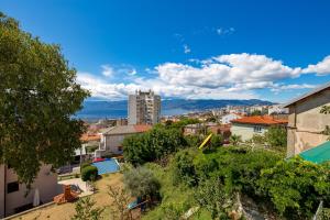 a view of a city with buildings and trees at Apartmants Belvedere Rijeka in Rijeka