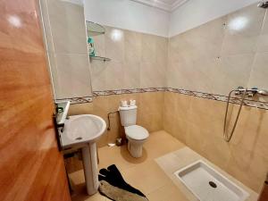 Koupelna v ubytování Residence Mly youssef appart + 13 fotografií