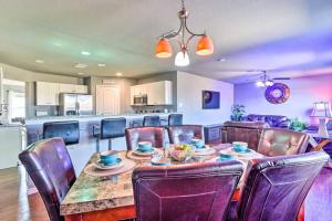 a dining room with a table and some chairs at Modern Home near Downtown Dallas in Lancaster +21 photos