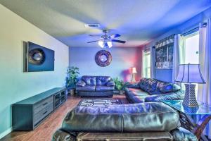 a living room with a couch and a table at Modern Home near Downtown Dallas in Lancaster
