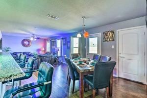 a dining room with a table and chairs at Modern Home near Downtown Dallas in Lancaster