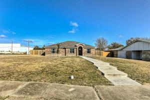 a brick house with a pathway leading to a yard at Modern Home near Downtown Dallas in Lancaster