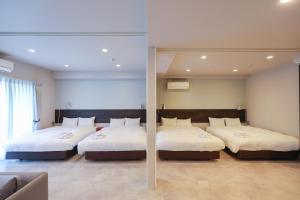 Cama o camas de una habitación en HOTEL so SUMIYOSHI