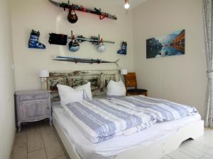 Katil atau katil-katil dalam bilik di Ferienwohnung Strandanker in Mönkebude