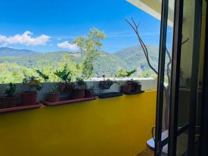 Uma vista geral da montanha ou uma vista da montanha a partir do quarto em acomodação particular