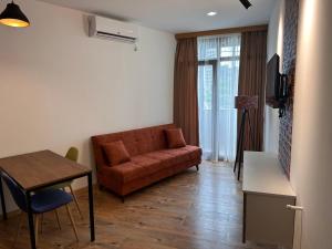 Posezení v ubytování Apartament Near the Sea