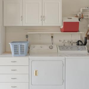 a kitchen with white cabinets and a stove top oven at 3896 Gather and Rest home in Del Rey Oaks