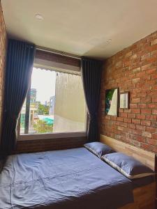Postel nebo postele na pokoji v ubytování IKIGAI Dorm Hostel - Danang Beach