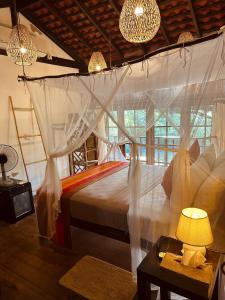 Katil atau katil-katil dalam bilik di Dunes Unawatuna Hotel