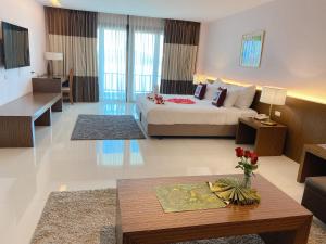 Μια τηλεόραση ή/και κέντρο ψυχαγωγίας στο Siam Triangle Hotel Chiang Sean