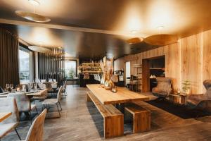 Area soggiorno di ALMMONTE PRÄCLARUM SUITES Design Hotel