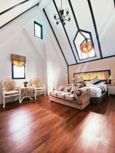 A bed or beds in a room at Gihak Homestay
