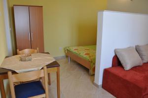 Postel nebo postele na pokoji v ubytování Apartments Dubravka