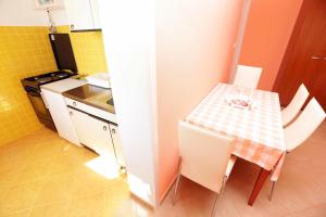 Kuchyň nebo kuchyňský kout v ubytování Apartments Dubravka