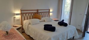 Photo de la galerie de l'établissement San Teodoro Rooms, à San Teodoro