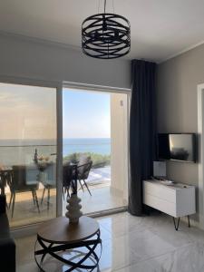 a living room with a view of the ocean at Villa Hvar in Ivan Dolac