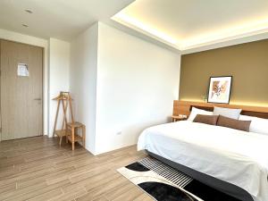 Postel nebo postele na pokoji v ubytování DOME Homestay
