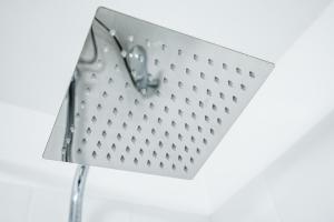 a metal object with holes in it on a white background at Train Station Serenity in Staines upon Thames