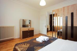 Postel nebo postele na pokoji v ubytování ABC Residence
