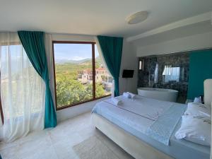 Postel nebo postele na pokoji v ubytování Villa Horus + 37 fotografií