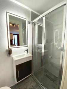 Koupelna v ubytování Citizen Suites