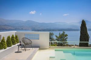 a villa with a view of the water at Villa Mirto - Iris sunset villas in Lépedha