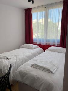 Postel nebo postele na pokoji v ubytování Citizen Suites